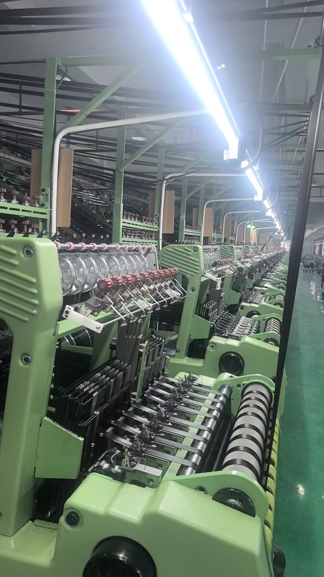 Detailed workshop view of Jinghui webbing equipment